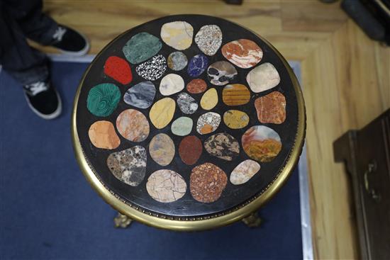 A circular specimen marble top brass tripod table, Diameter 38cm, H.72cm